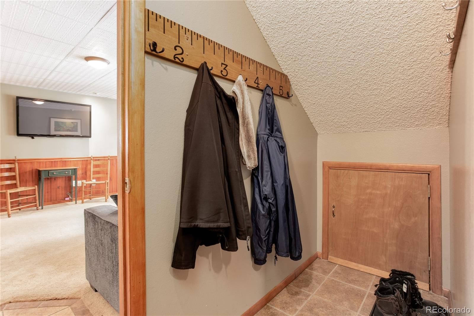 129 Bulldogger Road Bailey, CO 80421 - Photo 33 of 40 a view of walk in closet with clothes and shoes