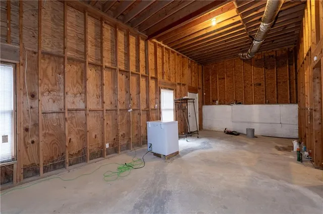 a view of front door with outdoor seating