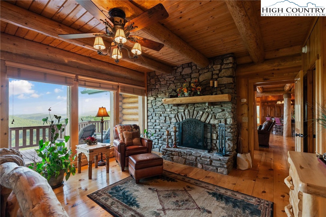 405 Elk Summit Drive Todd, NC 28684 - Photo 18 of 50 a outdoor living space with patio furniture and a potted plant