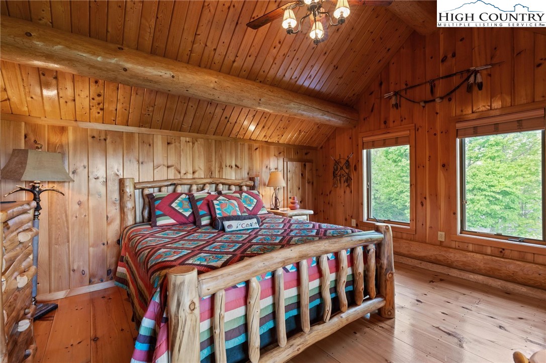 405 Elk Summit Drive Todd, NC 28684 - Photo 29 of 50 a bedroom with a bed next to a window