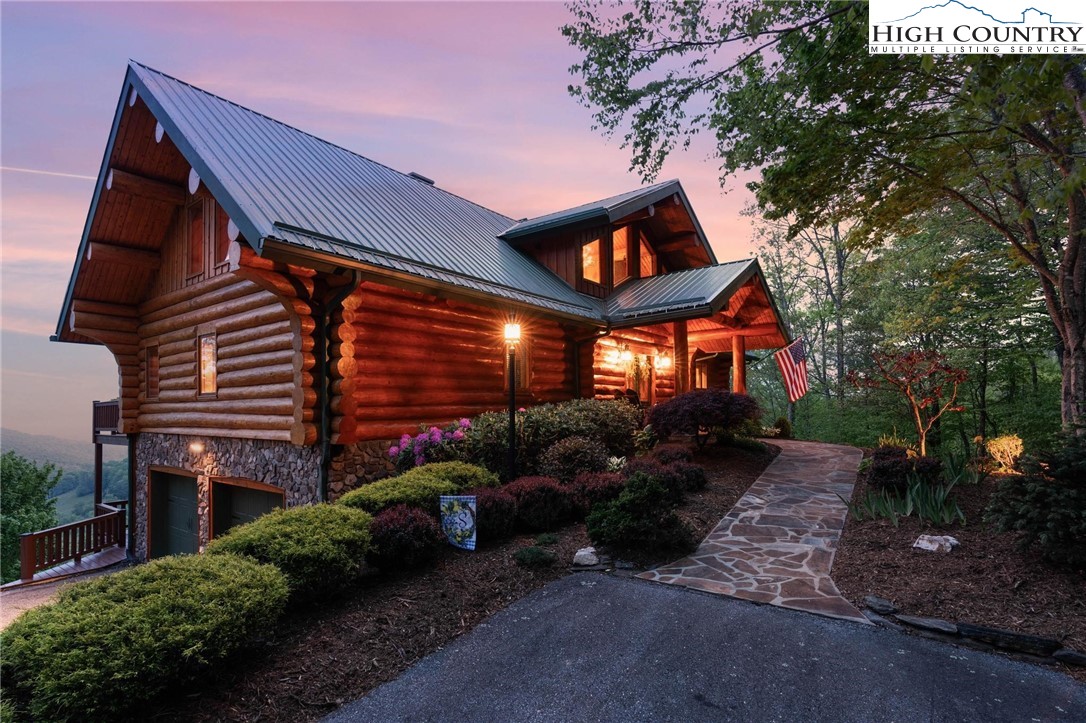 405 Elk Summit Drive Todd, NC 28684 - Photo 37 of 50 a view of a house with a yard