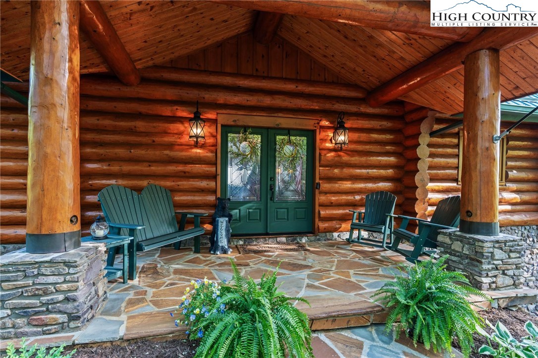 405 Elk Summit Drive Todd, NC 28684 - Photo 5 of 50 a backyard of a house with seating space