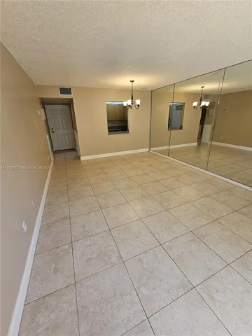 a view of a livingroom with a furniture