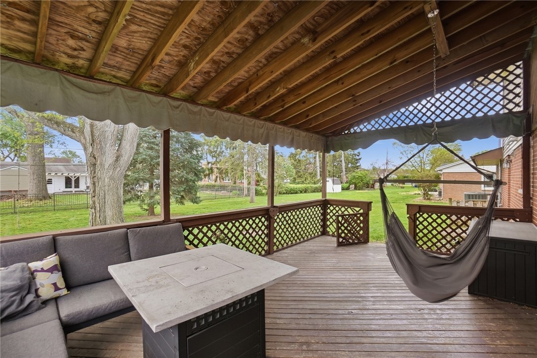 150 Littlejohn Road Troy, OH 45373 - Photo 35 of 40 This spacious covered patio offers a relaxing outdoor living space, perfect for entertaining.