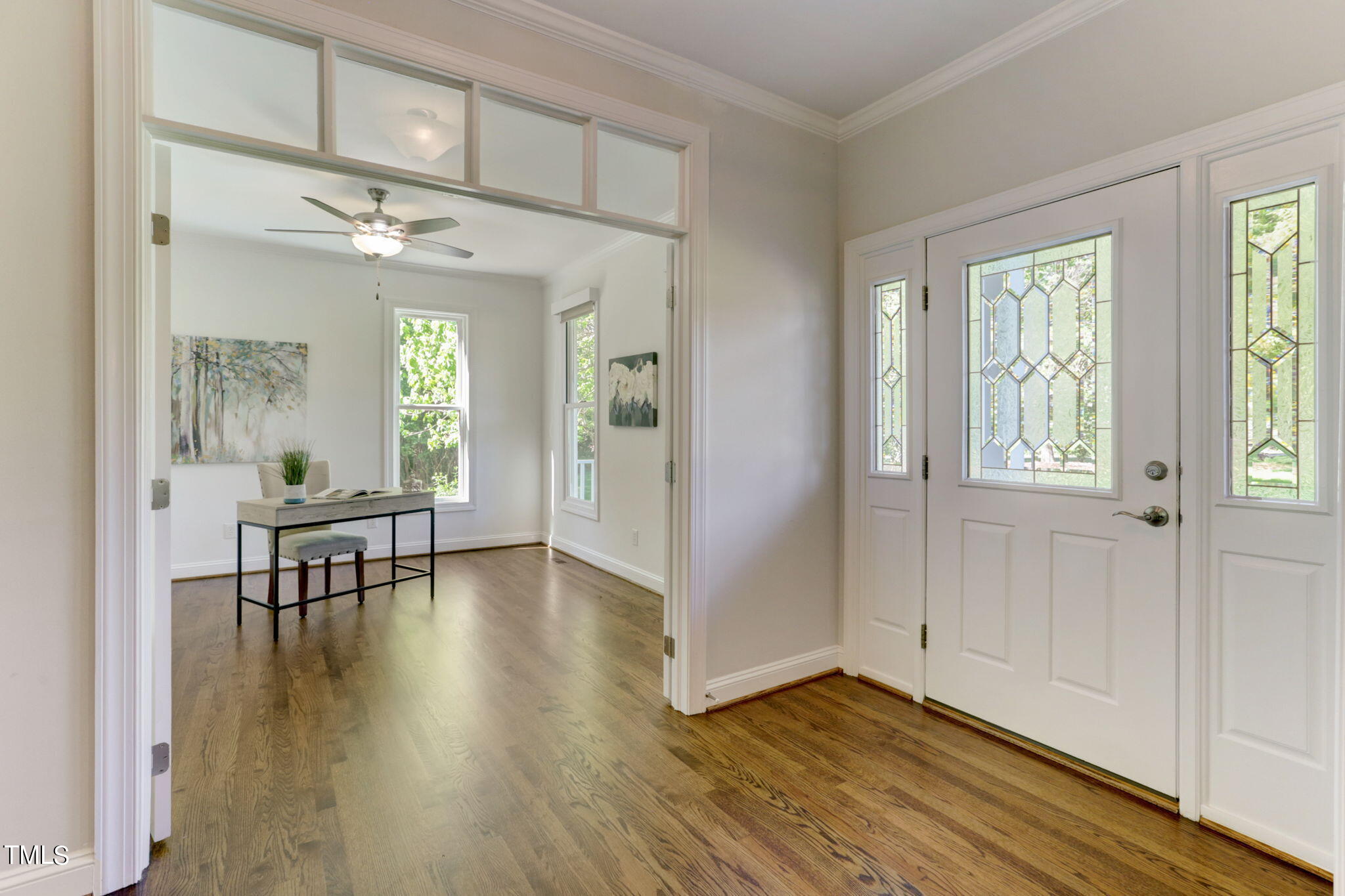 1029 Sunset Meadows Drive Apex, NC 27523 - Photo 14 of 52 a view of empty room with wooden floor and fan