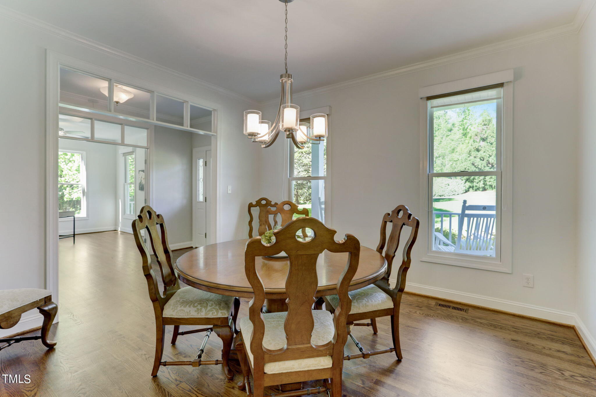 1029 Sunset Meadows Drive Apex, NC 27523 - Photo 19 of 52 a dining room with furniture and window