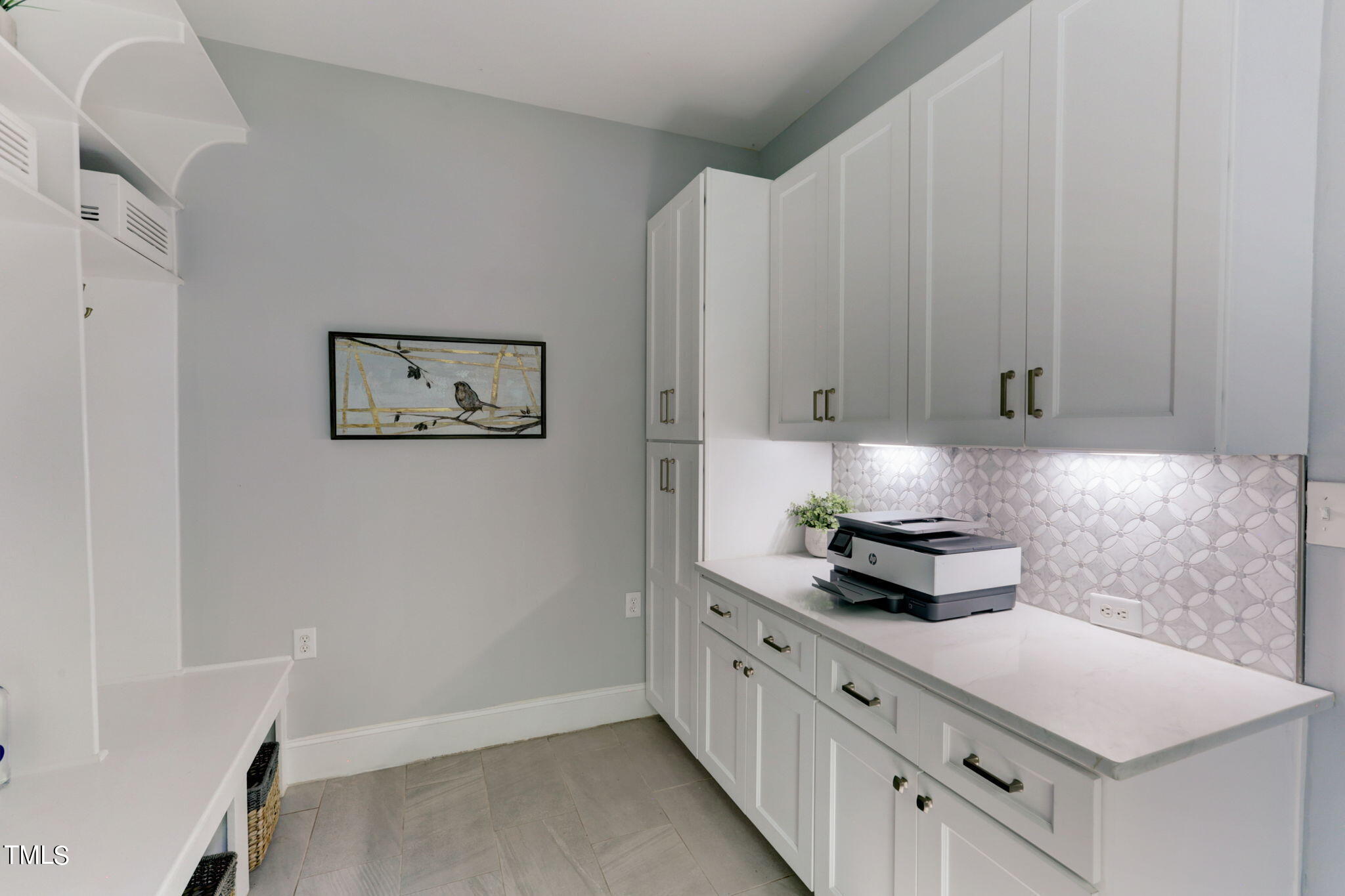 1029 Sunset Meadows Drive Apex, NC 27523 - Photo 28 of 52 a kitchen with stainless steel appliances a cabinets and a stove top oven