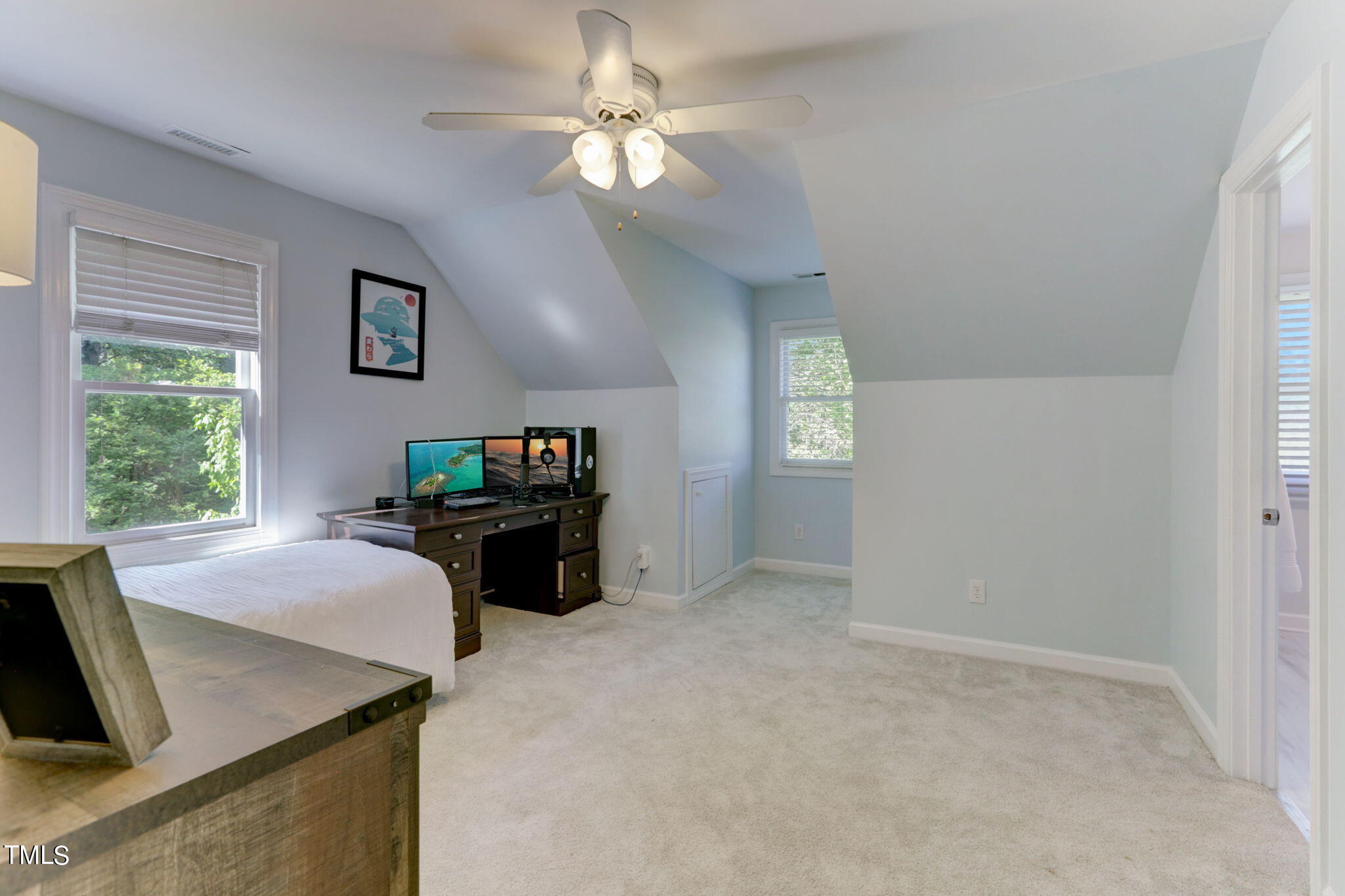 1029 Sunset Meadows Drive Apex, NC 27523 - Photo 31 of 52 a living room with furniture a fireplace and a flat screen tv