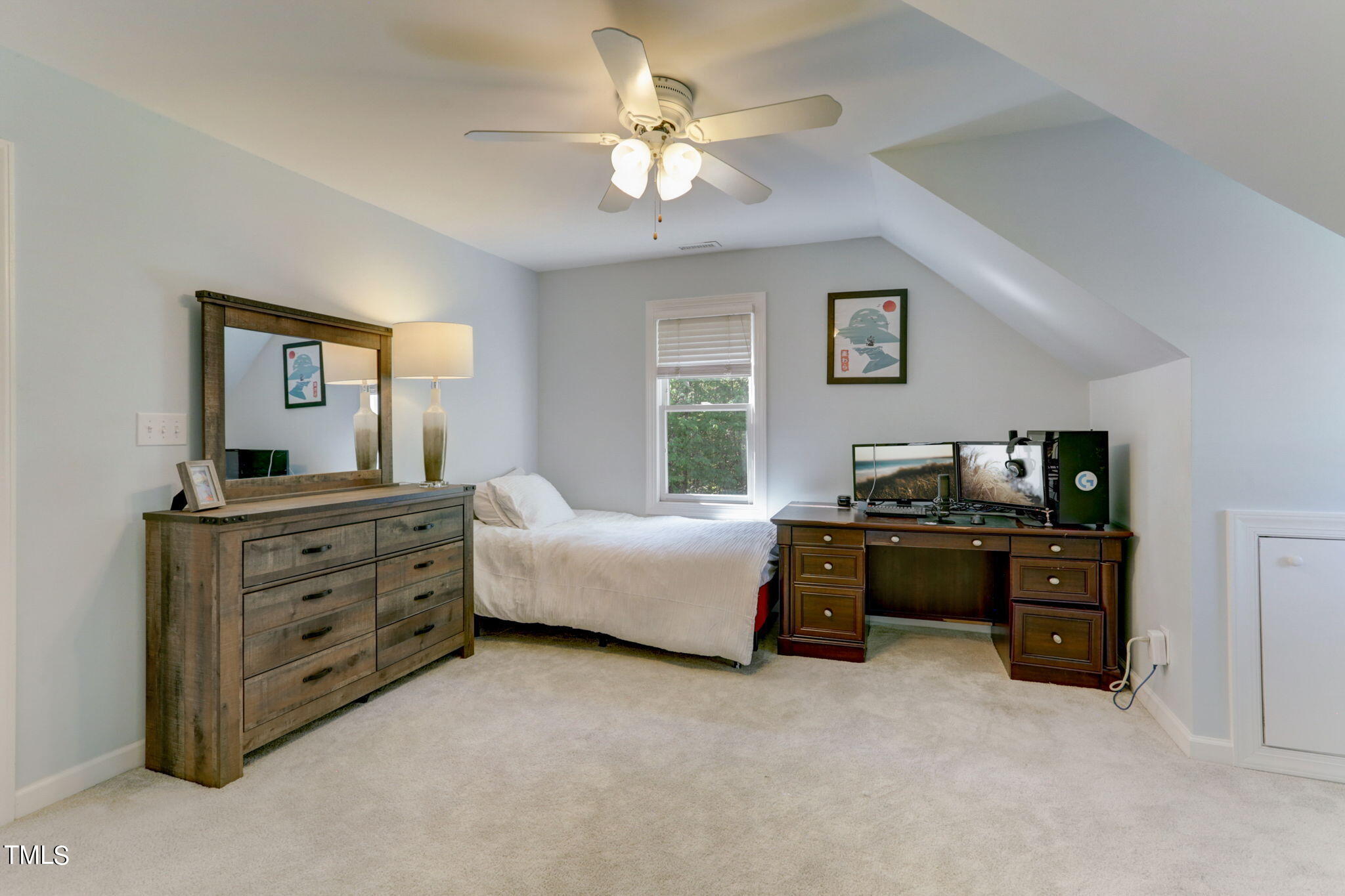 1029 Sunset Meadows Drive Apex, NC 27523 - Photo 33 of 52 a living room with furniture and a flat screen tv