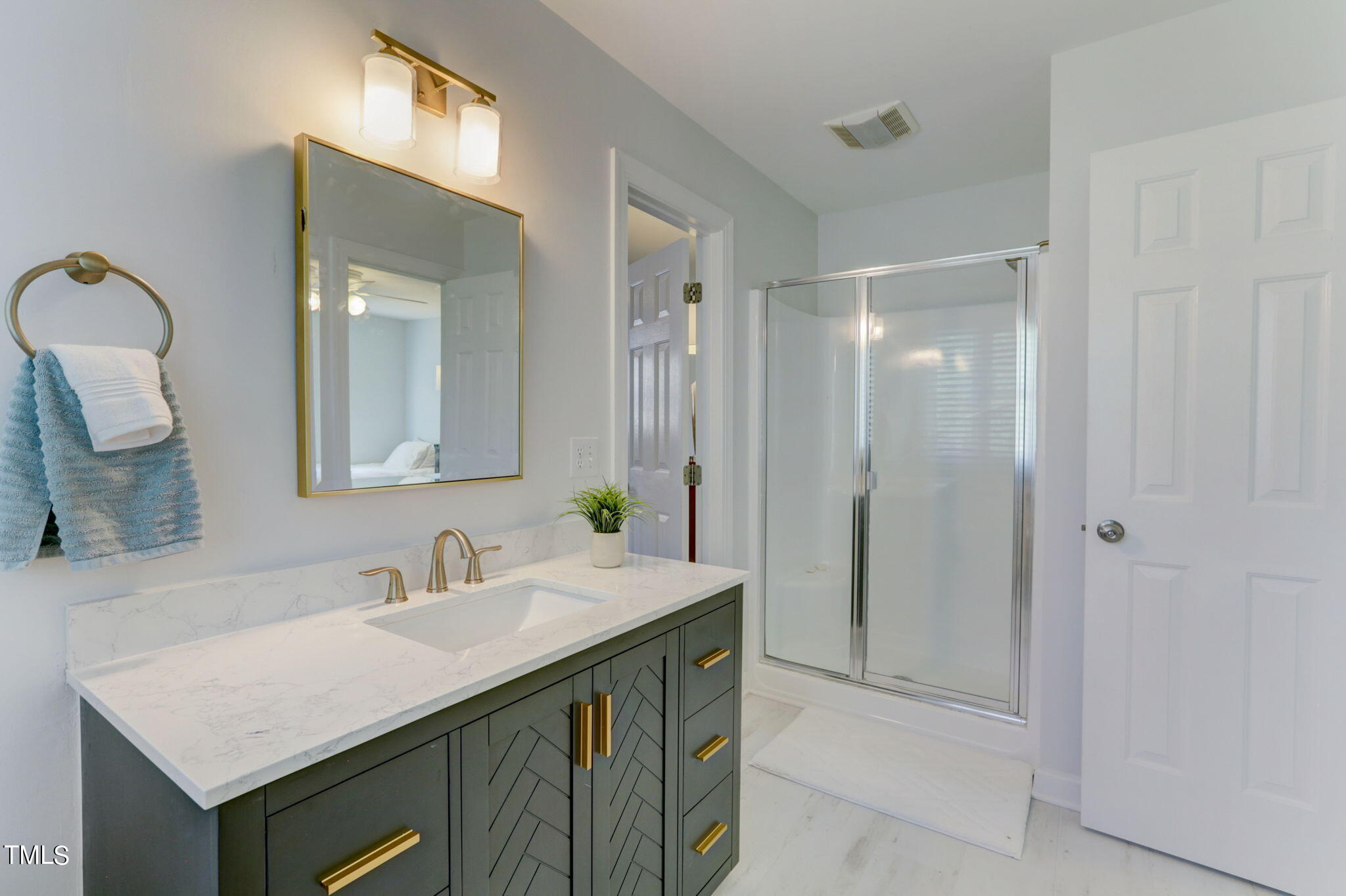 1029 Sunset Meadows Drive Apex, NC 27523 - Photo 35 of 52 a bathroom with a sink double vanity and a mirror