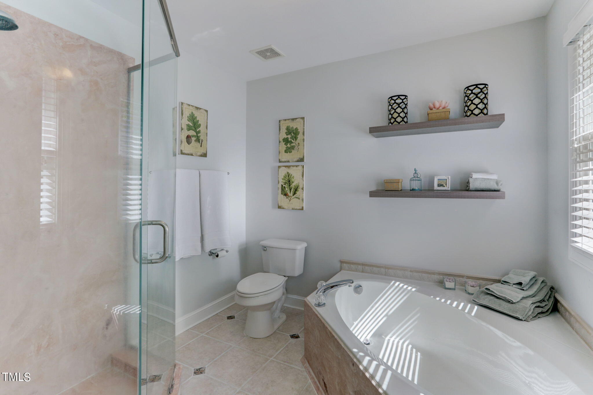 1029 Sunset Meadows Drive Apex, NC 27523 - Photo 41 of 52 a bedroom with a bed and the view of bathroom