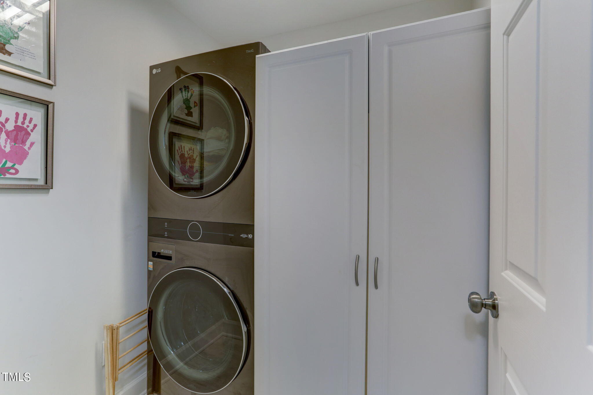 1029 Sunset Meadows Drive Apex, NC 27523 - Photo 43 of 52 a utility room with dryer and washer