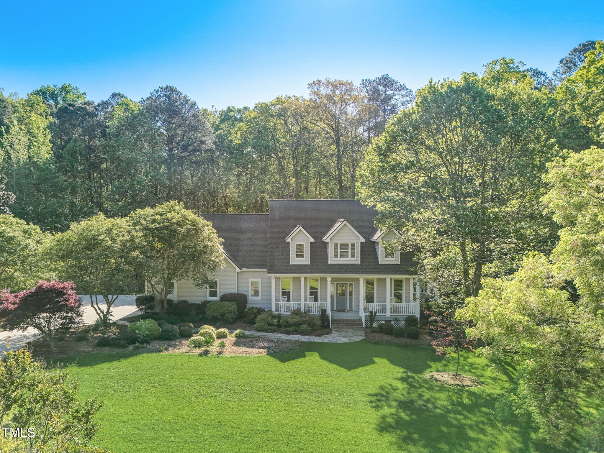1029 Sunset Meadows Drive Apex, NC 27523 - Photo 46 of 52 a front view of a house with garden