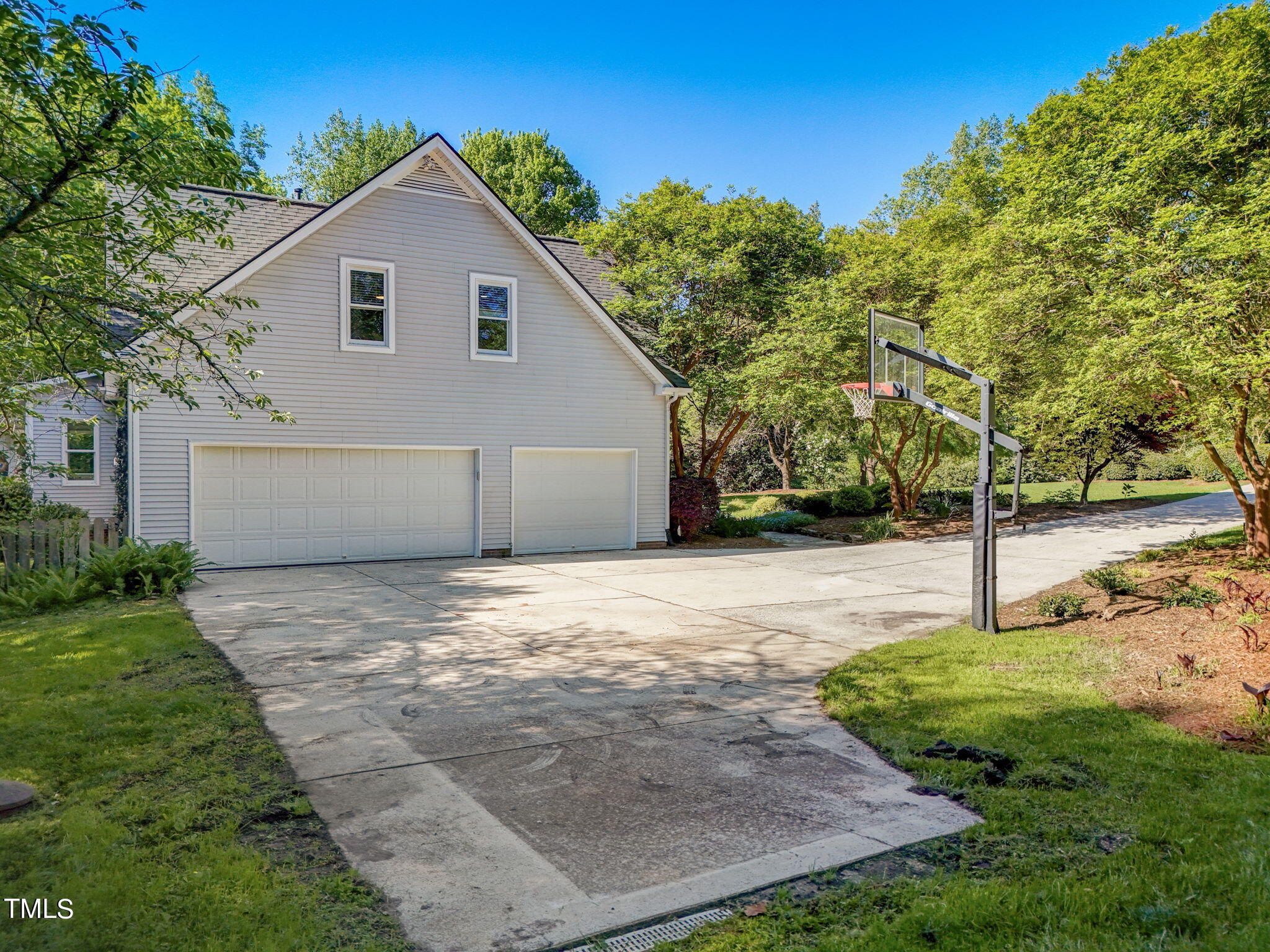 1029 Sunset Meadows Drive Apex, NC 27523 - Photo 52 of 52 a view of a backyard of a house