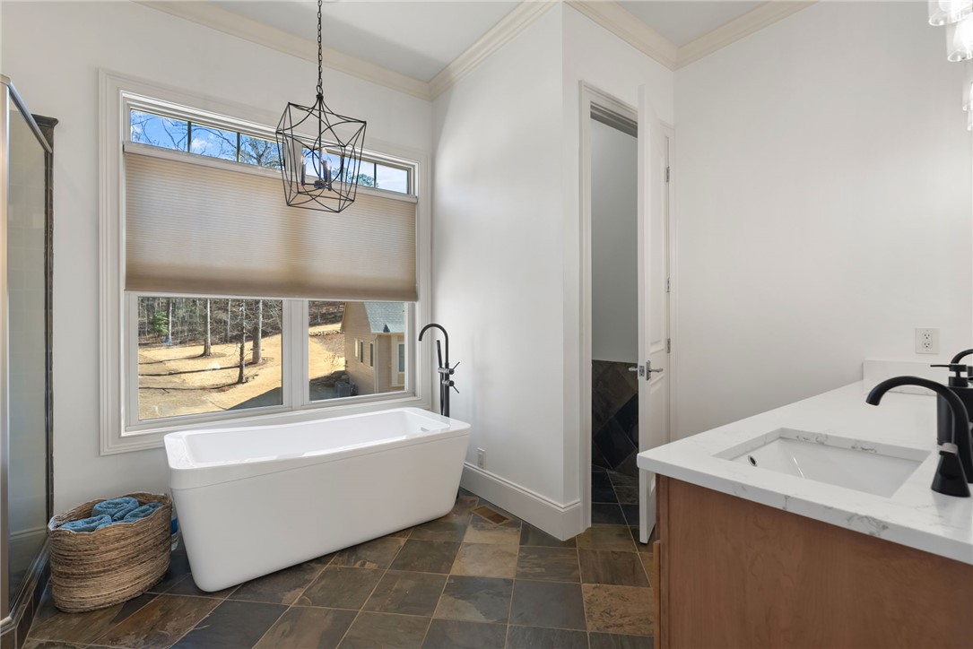 505 Northview Court Fair Play, SC 29643 - Photo 23 of 48 This tranquil bathroom features a freestanding tub, offering a peaceful retreat.
