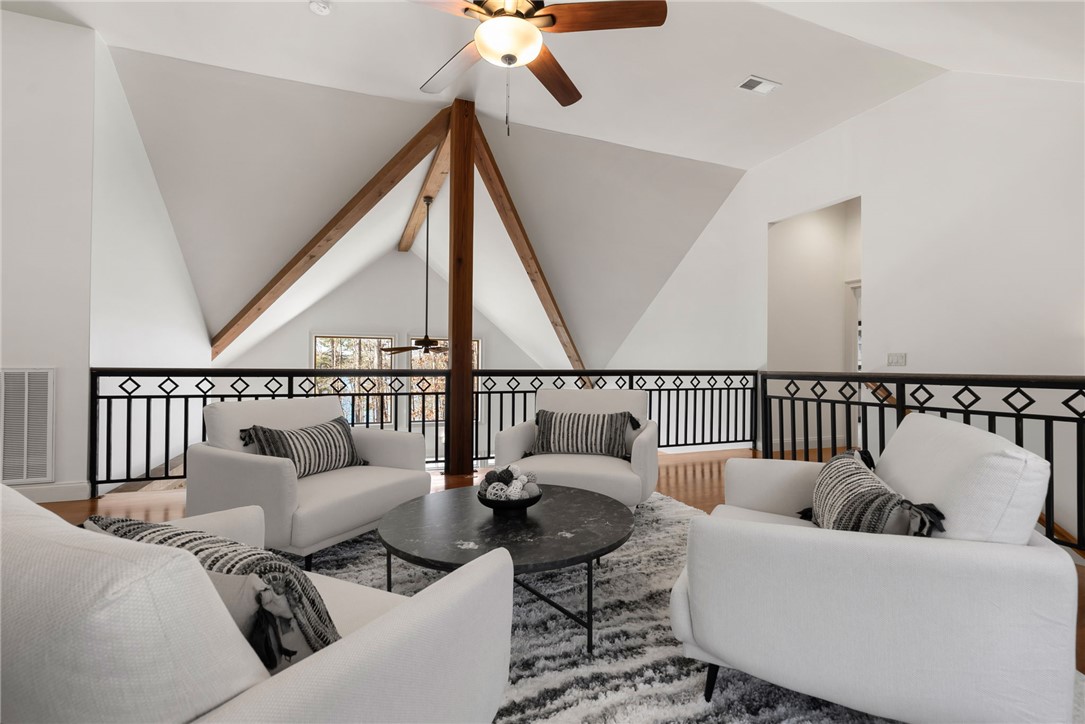 505 Northview Court Fair Play, SC 29643 - Photo 26 of 48 This living room features high vaulted ceilings and beautiful hardwood floors.