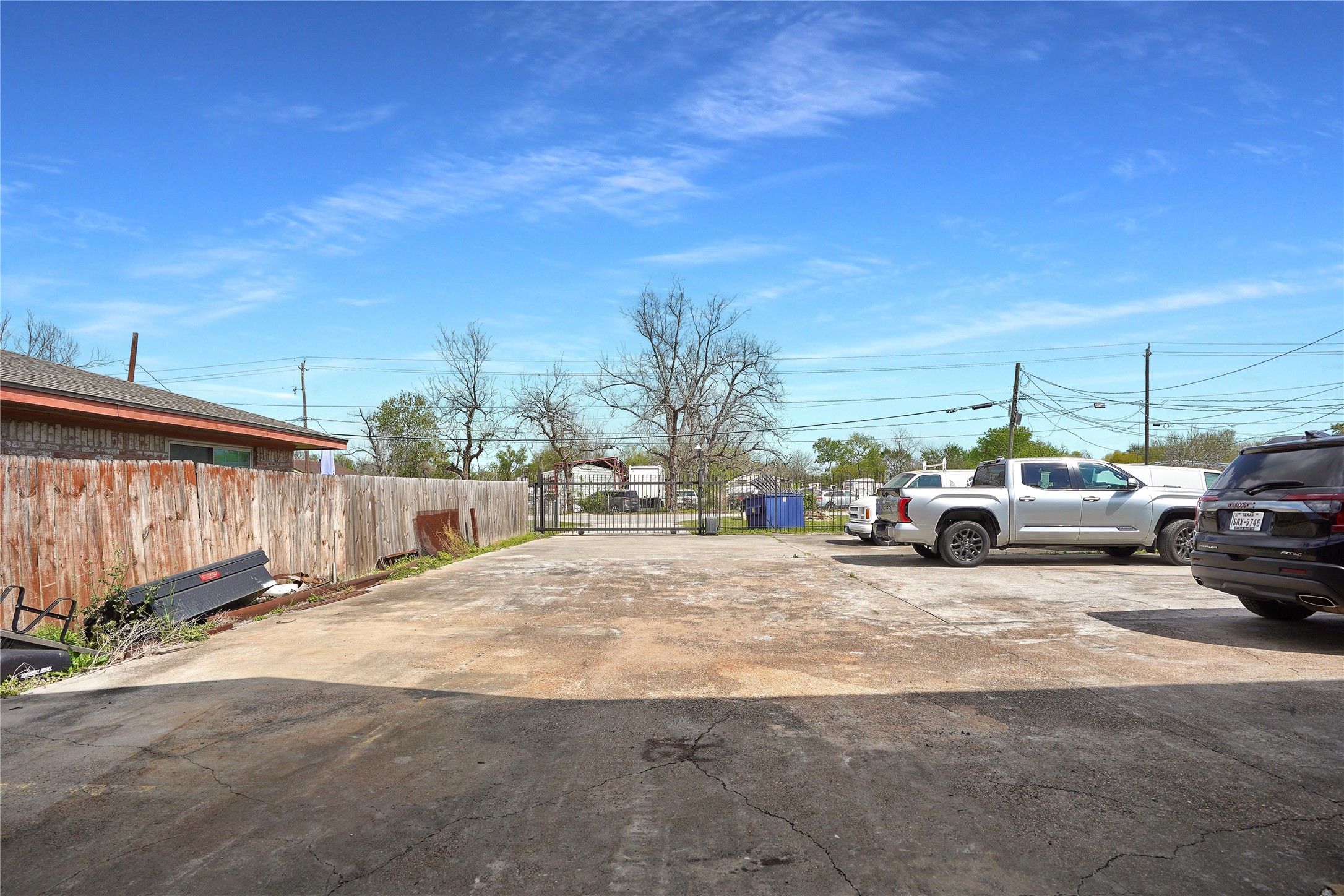 13301-13309 Reeveston Road Houston, TX 77039 - Photo 14 of 35 a view of a cars park in front of a house