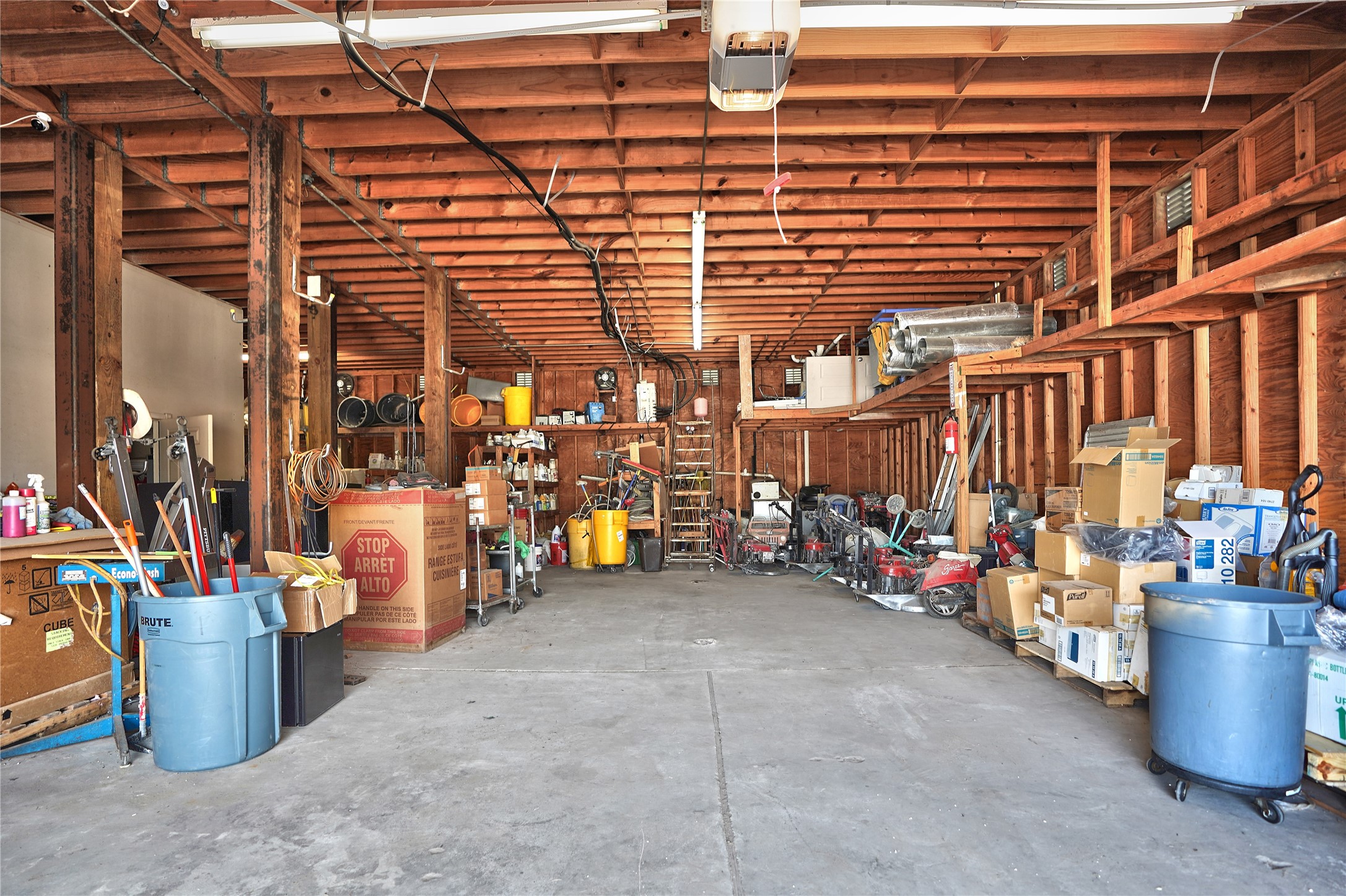 13301-13309 Reeveston Road Houston, TX 77039 - Photo 19 of 35 a view of parking area with a lot of stuff