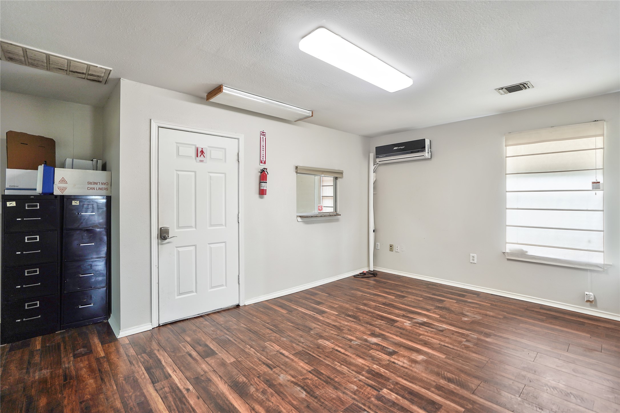 13301-13309 Reeveston Road Houston, TX 77039 - Photo 28 of 35 a view of empty room with wooden floor