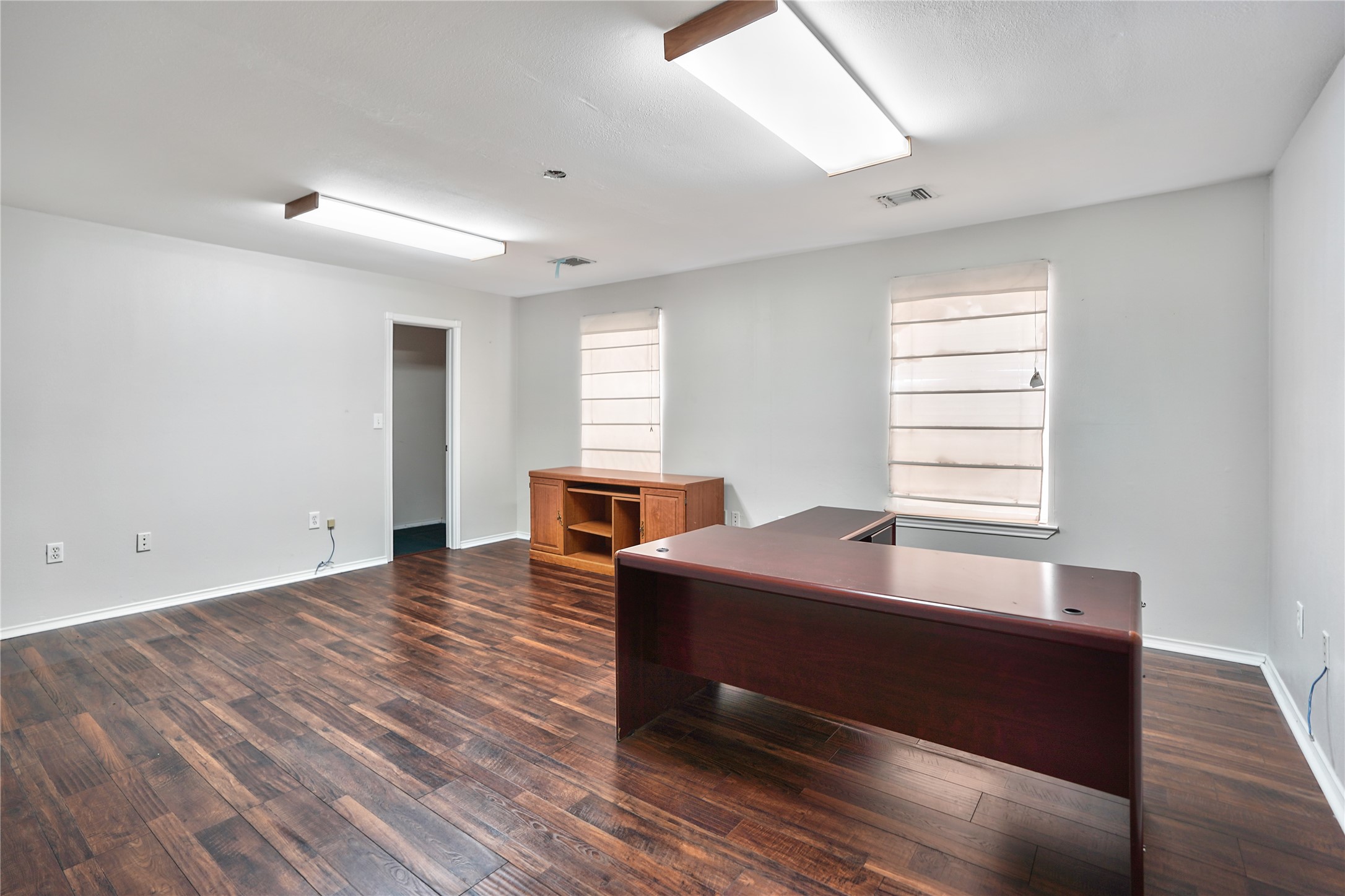13301-13309 Reeveston Road Houston, TX 77039 - Photo 33 of 35 a living room with a bed furniture and a window