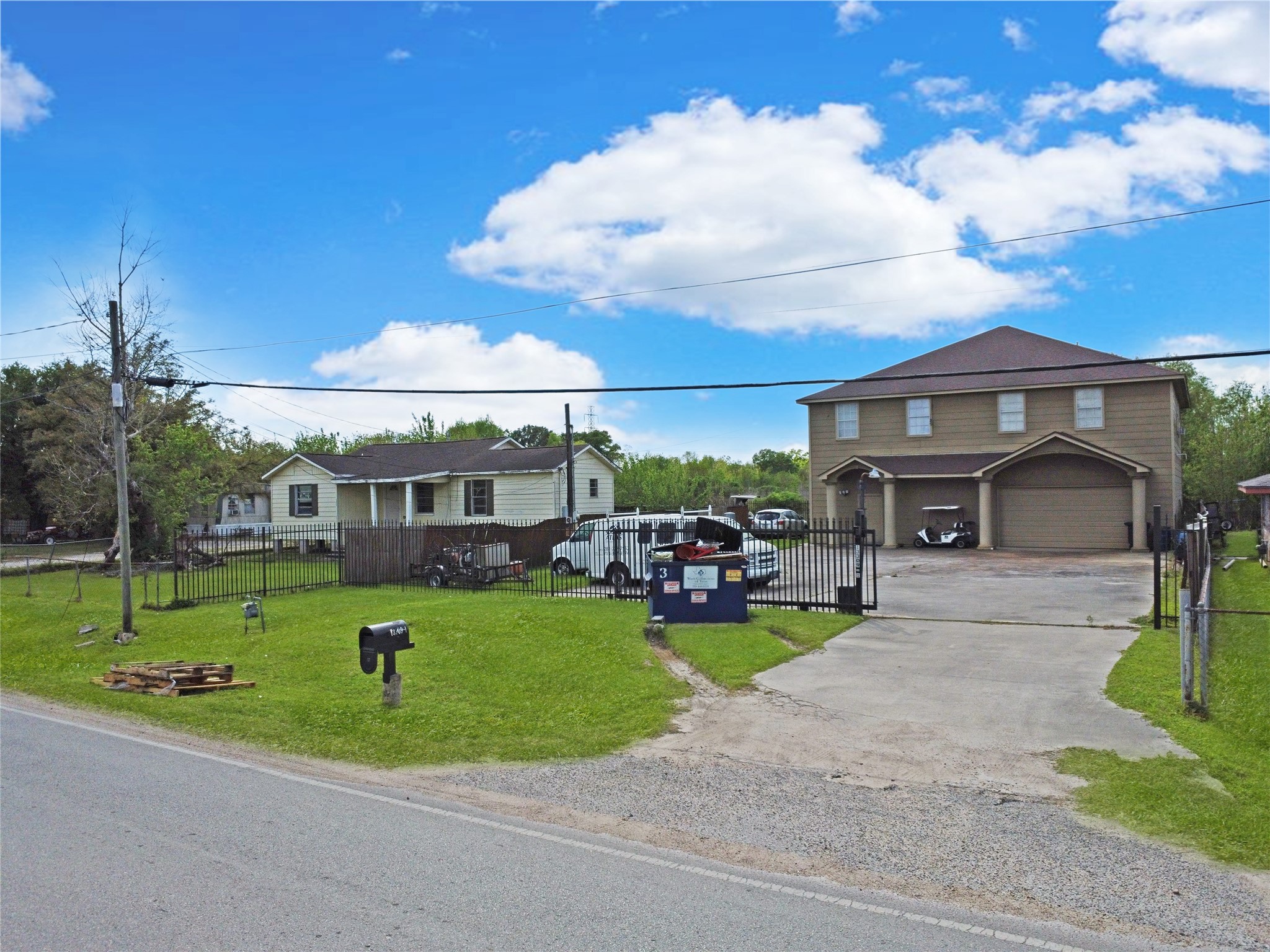 13301-13309 Reeveston Road Houston, TX 77039 - Photo 6 of 35 a view of a house with a entertaining space and a small yard