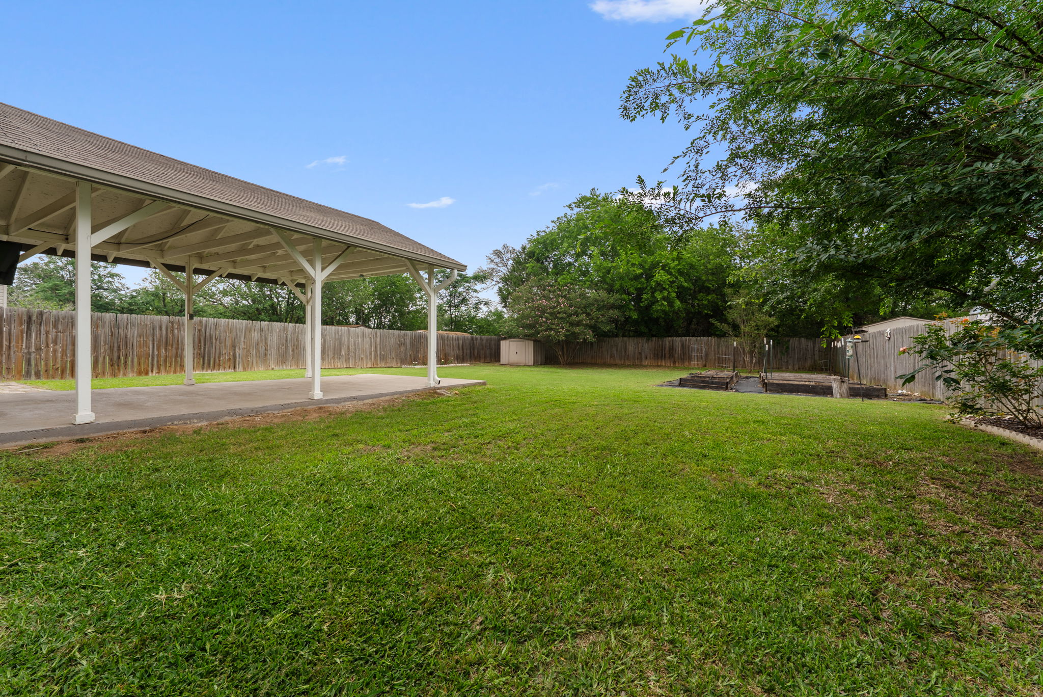 7327 Pusch Ridge Loop Austin, TX 78749 - Photo 25 of 26 a view of a house with a backyard