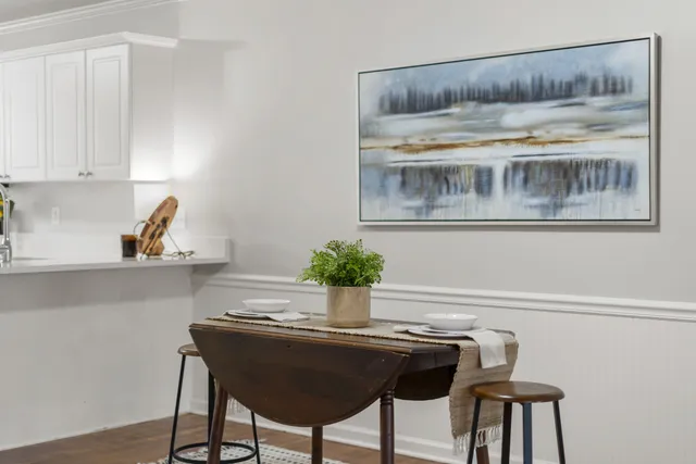 a bathroom with a sink toilet and mirror