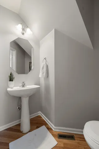 a kitchen with stainless steel appliances granite countertop a refrigerator sink and stove