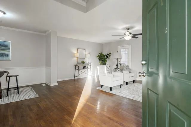 a living room with furniture and a couch