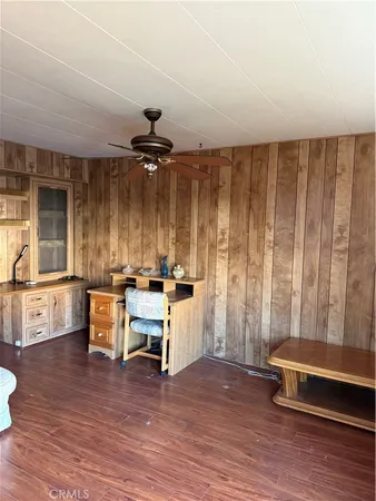 a view of a livingroom with furniture and window