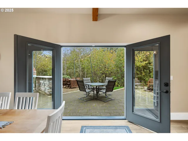 a view of a room with a table and chair