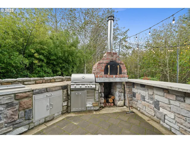 a view of a balcony with furniture and garden