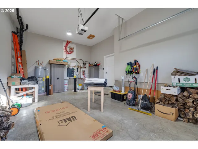 a view of a play room with furniture and toys