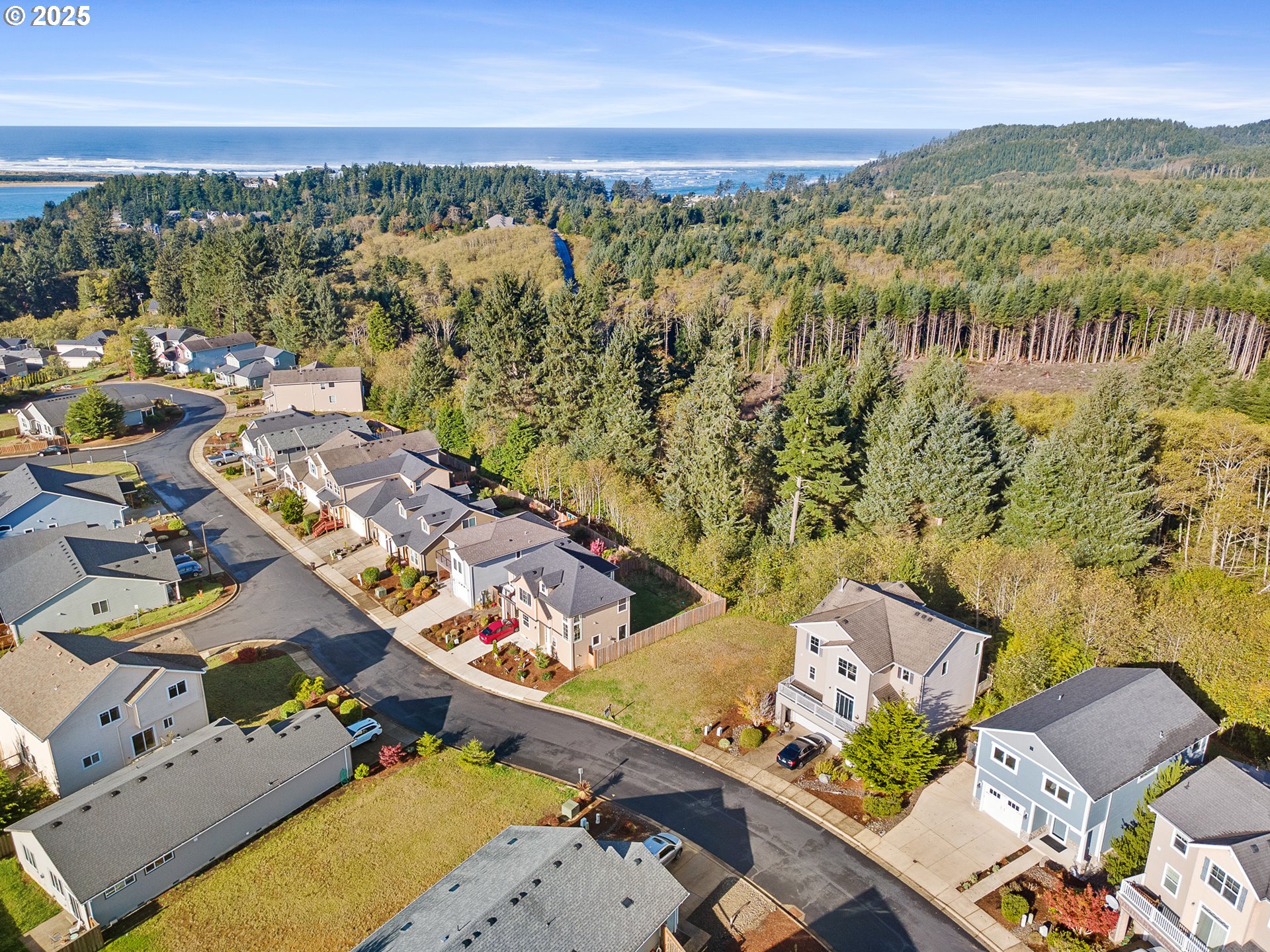 4380 Sequoia Loop Tillamook, OR 97141 - Photo 39 of 40 an aerial view of residential houses with outdoor space
