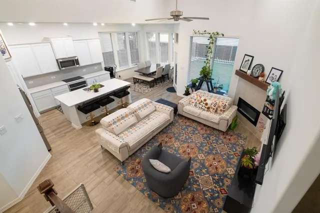 a living room with furniture and a rug