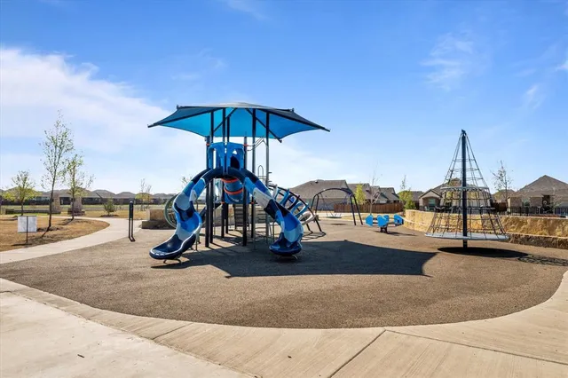 a view of a park with a slide