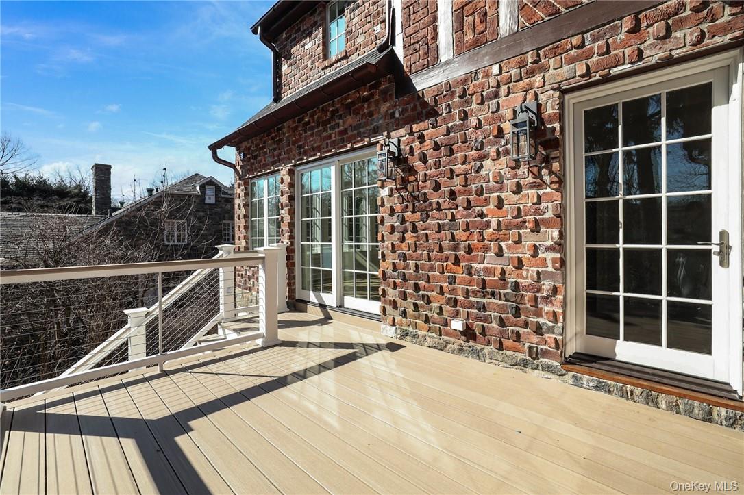 40 Mendota Avenue Rye, NY 10580 - Photo 16 of 31 Deck with staircase down to back yard