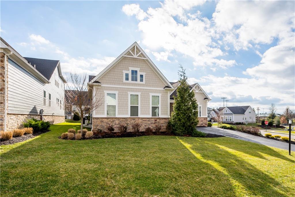 3031 Spruce Road Gibsonia, PA 15044 - Photo 5 of 49 a front view of a house with garden