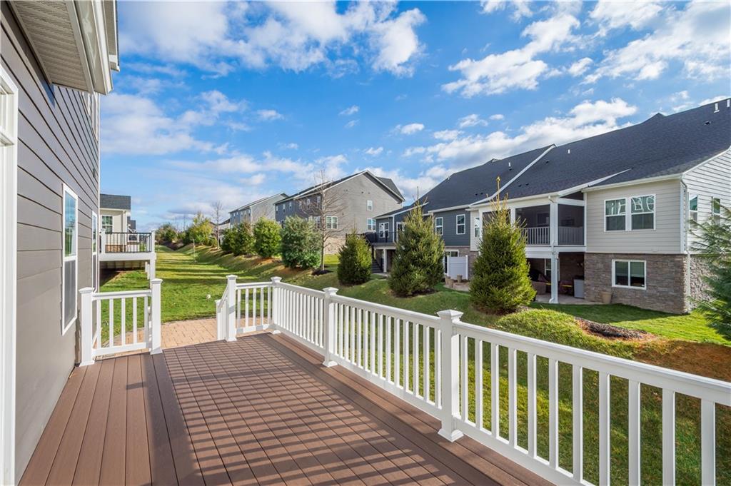 3031 Spruce Road Gibsonia, PA 15044 - Photo 7 of 49 a view of a house with a wooden deck