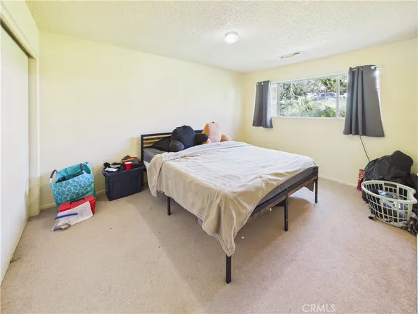 a view of kitchen with furniture and wooden floor