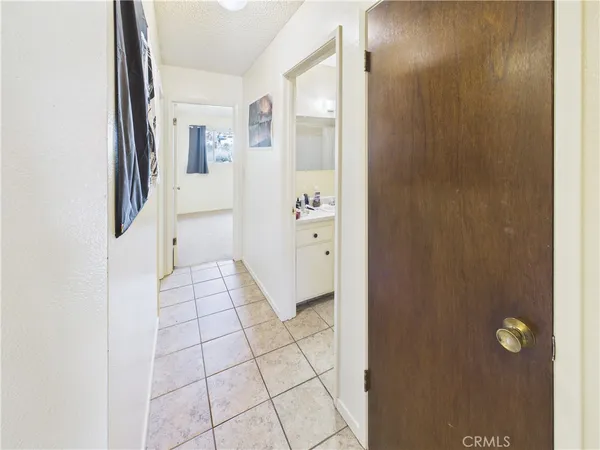 a bathroom with a sink vanity and a mirror