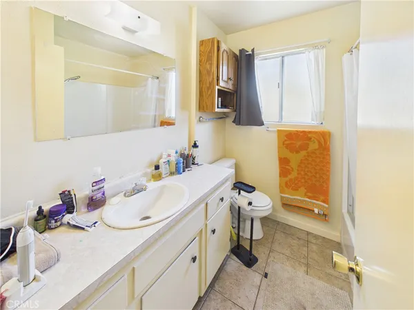 a view of a balcony with wooden floor