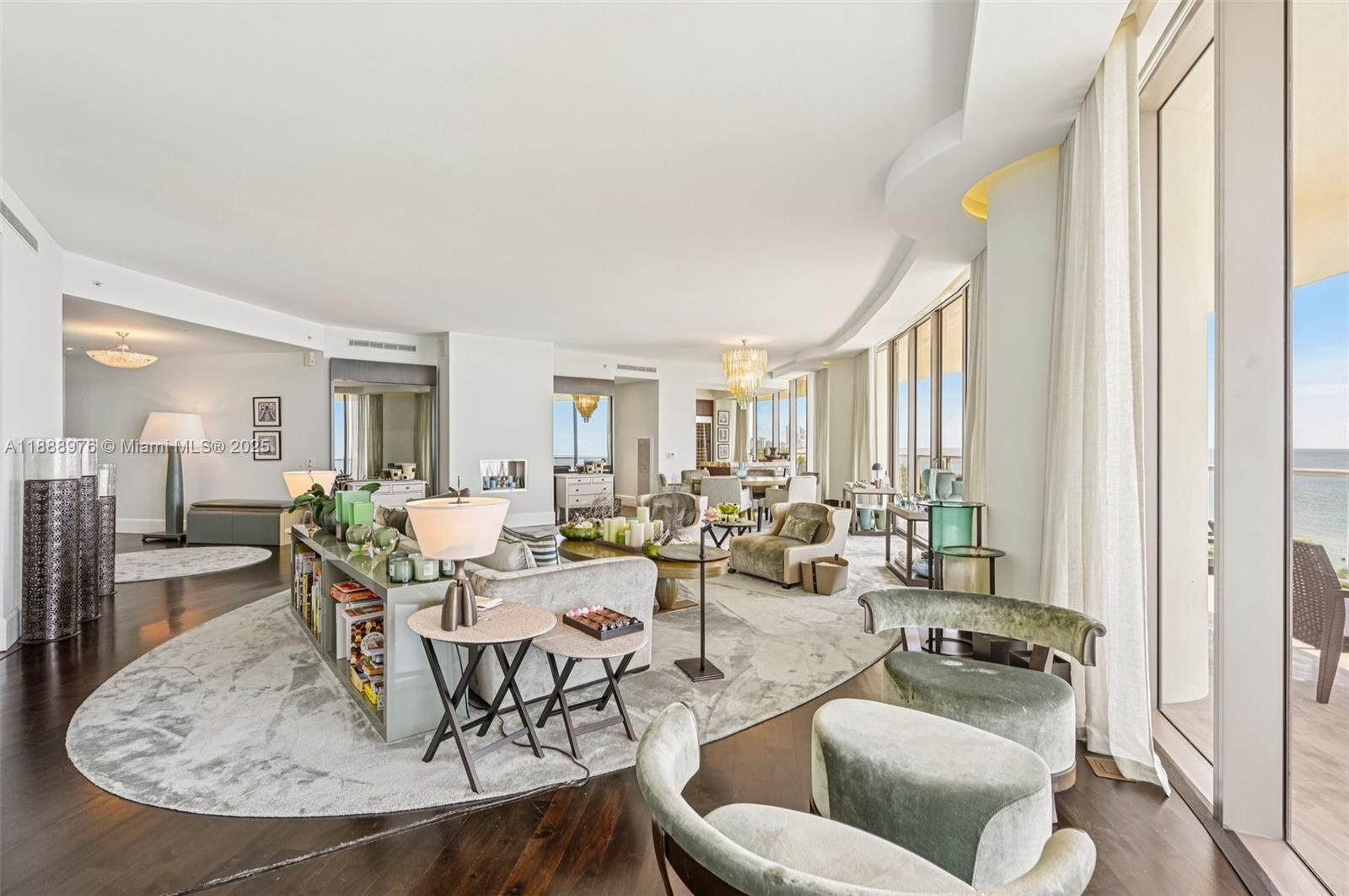 9703 Collins Avenue, Unit 600 Bal Harbour, FL 33154 - Photo 12 of 53 a living room with furniture and a table