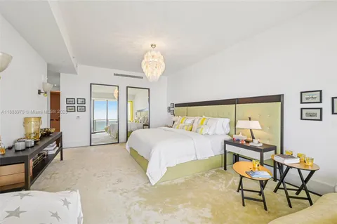 a bathroom with a shower and a sink