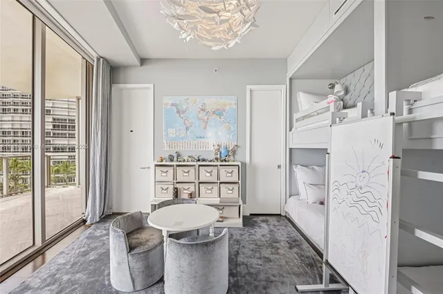 a bathroom with a double vanity sink toilet mirror and shower