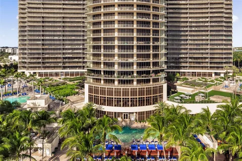 a view of a city with an ocean view