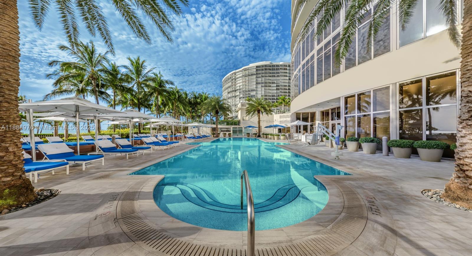 9703 Collins Avenue, Unit 600 Bal Harbour, FL 33154 - Photo 53 of 53 a swimming pool with outdoor seating and yard