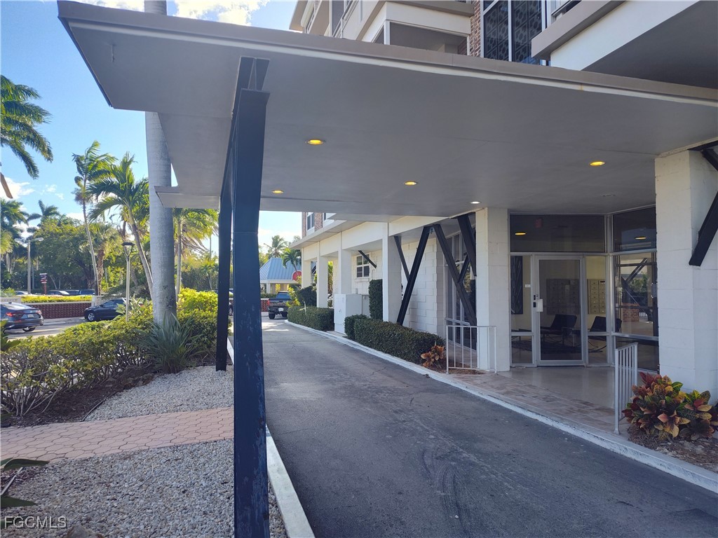 2350 West First Street, Unit 203 Fort Myers, FL 33901 - Photo 13 of 15 a view of a house with a porch