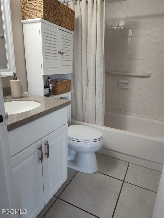 2350 West First Street, Unit 203 Fort Myers, FL 33901 - Photo 8 of 15 a bathroom with a sink a toilet and shower