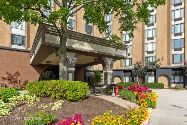 1 Renaissance Place, Unit 706 Palatine, IL 60067 - Photo 2 of 12 a front view of a multi story residential apartment buildings